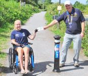 Beckie receiving cheque from Lion President