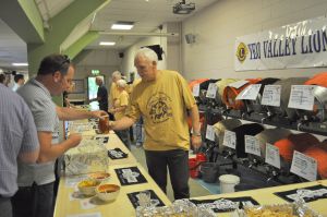 Lion Brian Winter serving beer at the 2014 Festival